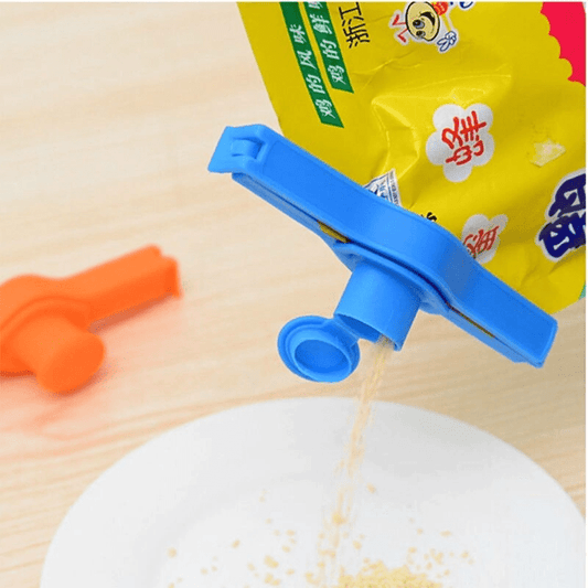 Cierra Paquetes Con Pico A Tapa Color Rosa